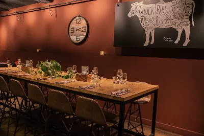 Vanaf onze Chefs Table heb je uitzicht op de keuken